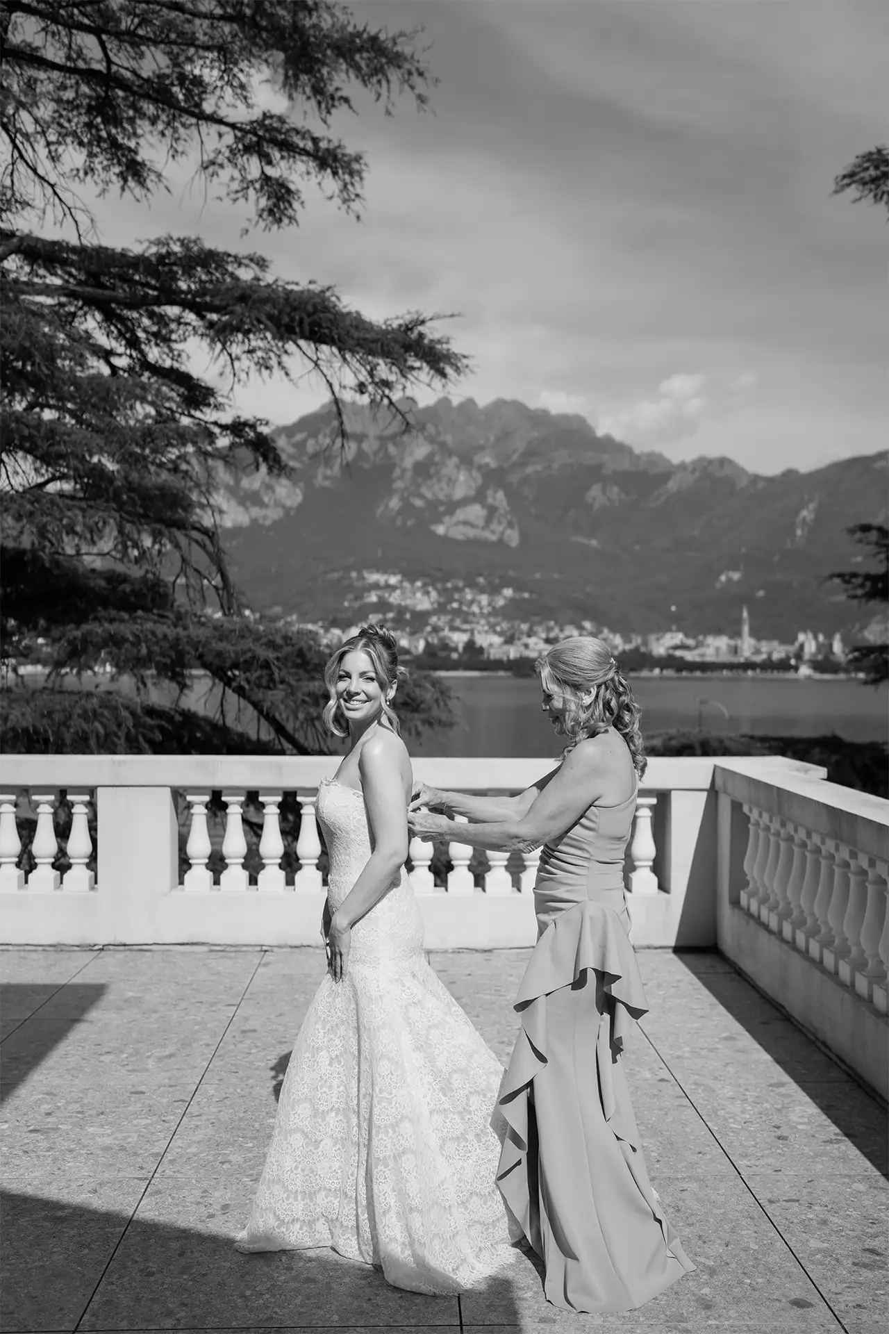 Bride getting dressed on the terrace before her Villa Giulia wedding