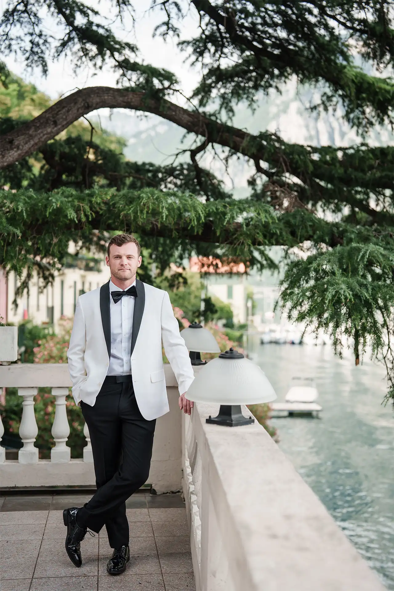 Groom portrait on the terrace at Villa Giulia overlooking Lake Como