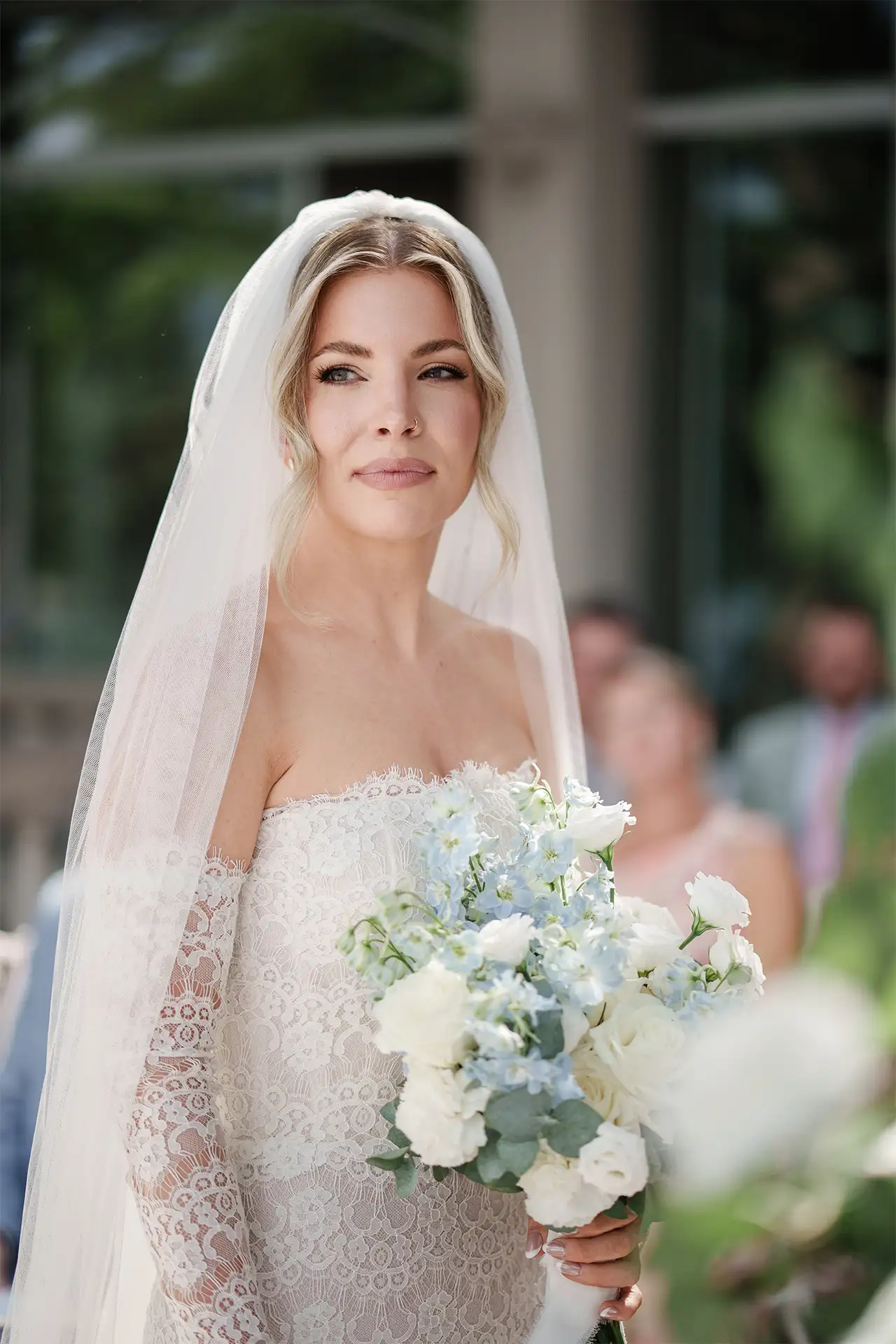Bride holding her bouquet during the Lake Como wedding ceremony