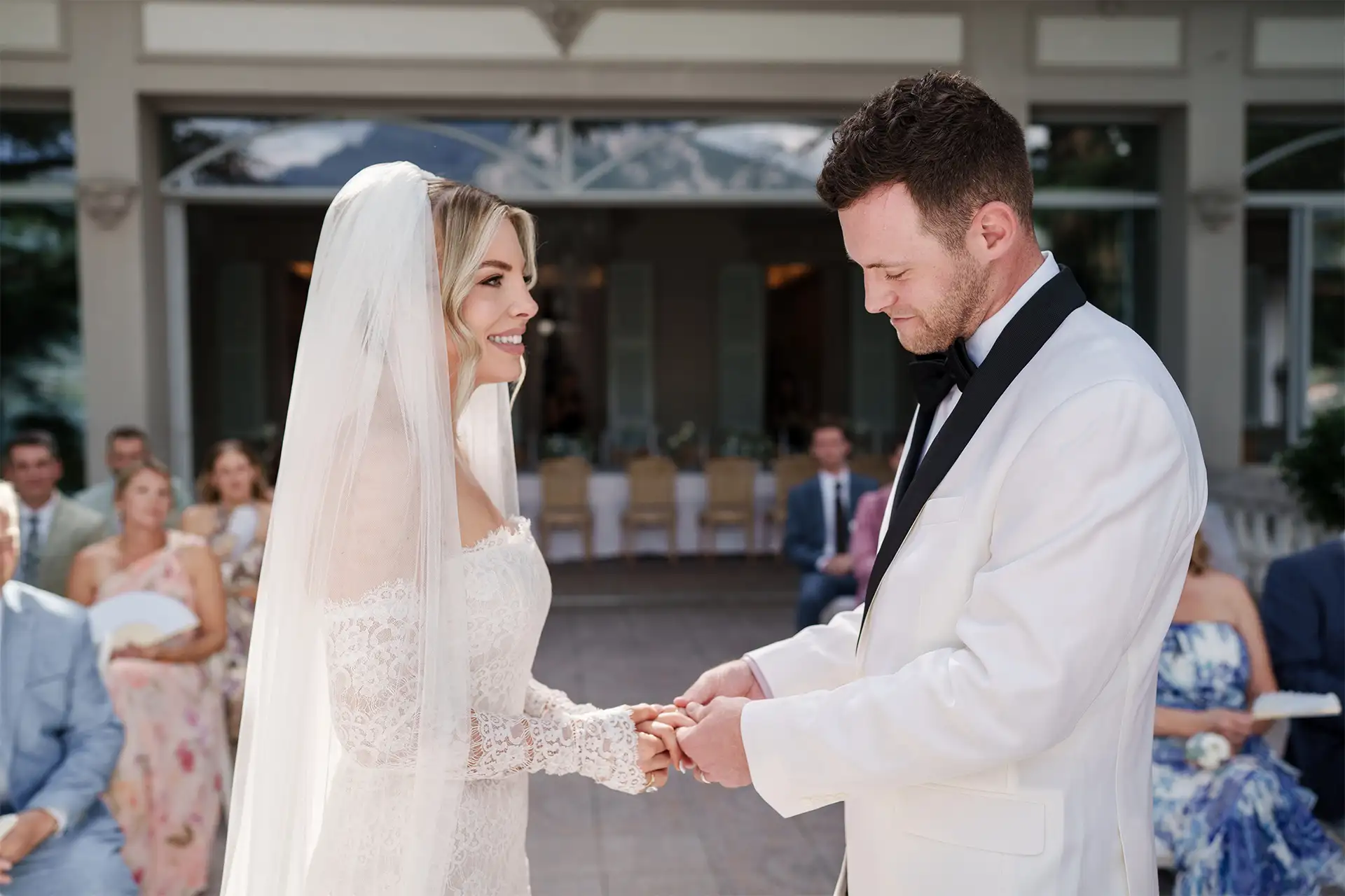 Bride and groom exchanging rings during a Villa Giulia wedding