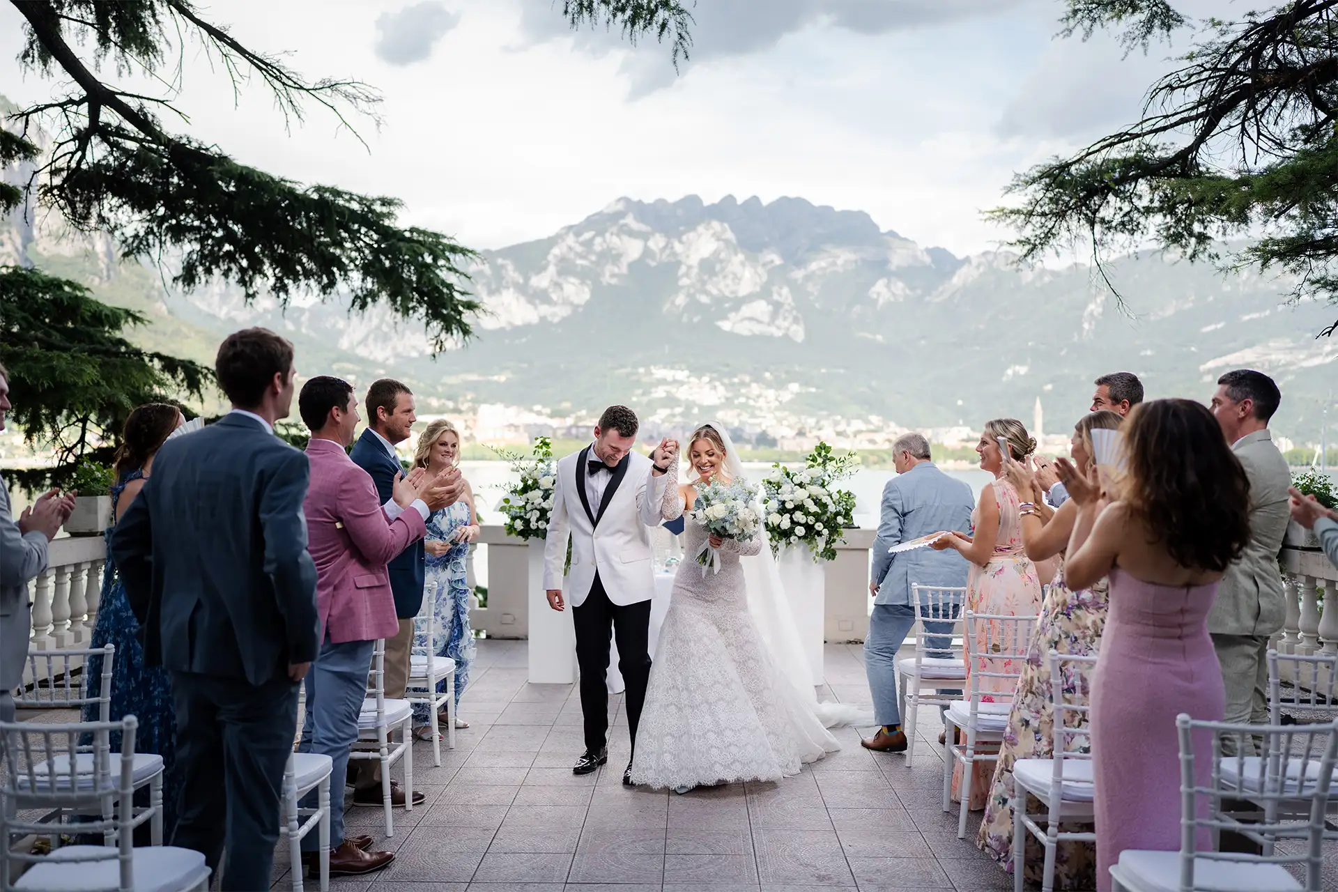 Newlyweds walking back down the aisle after their Villa Giulia wedding ceremony