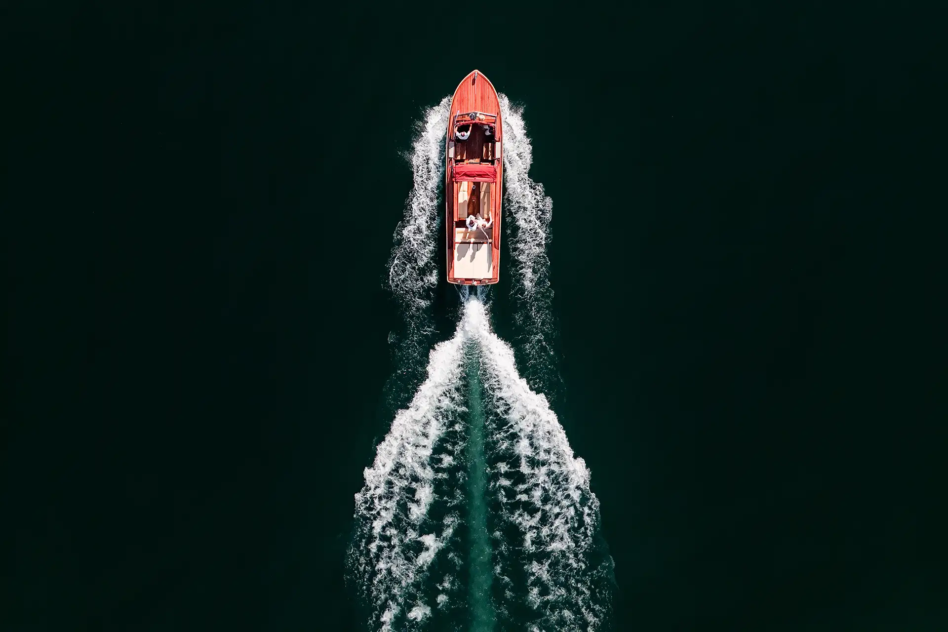 Aerial view of a wedding boat ride on Lake Como