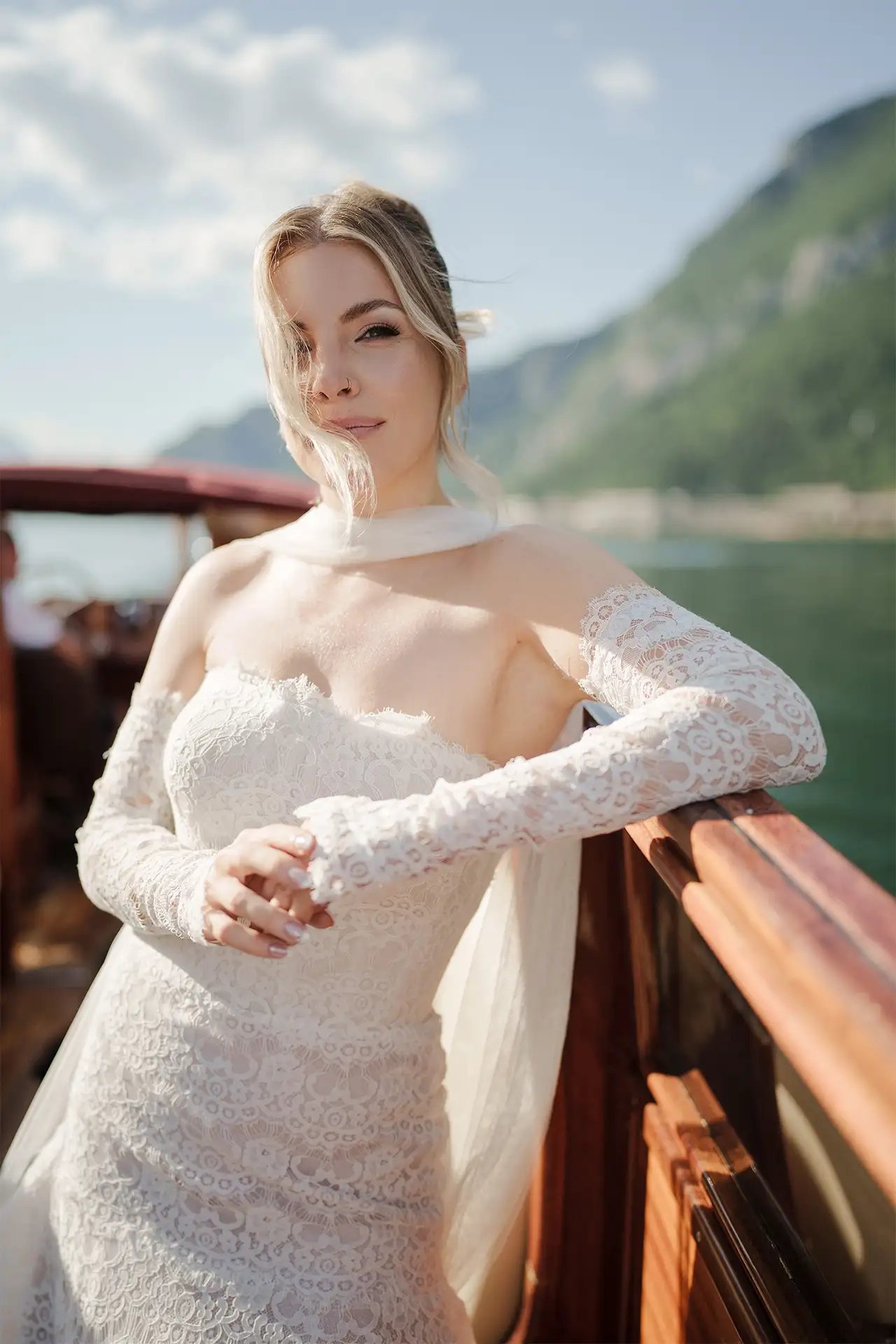 Editorial bridal portrait on a wooden boat during a Lake Como wedding