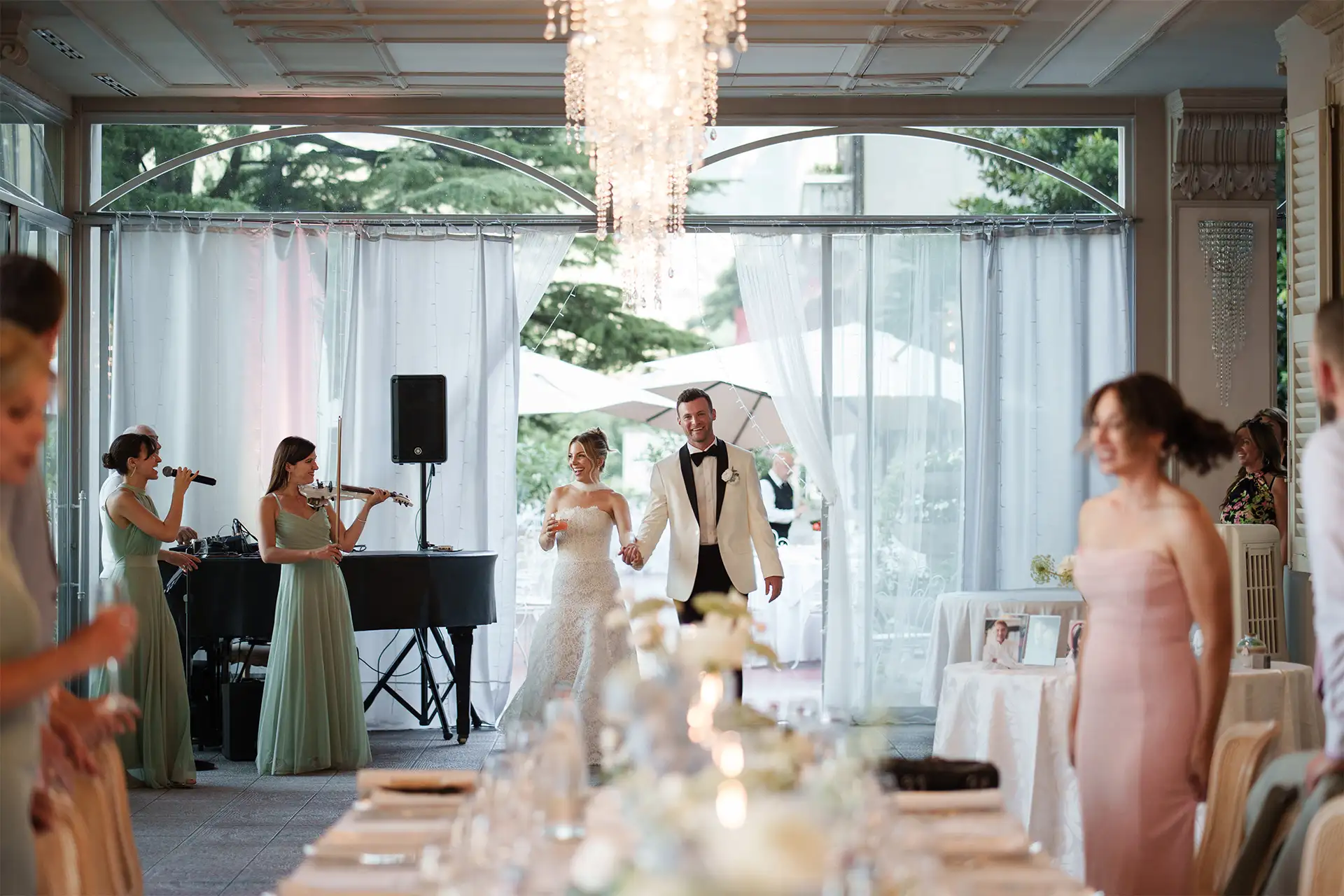 Newlyweds entering the wedding reception at Villa Giulia on Lake Como